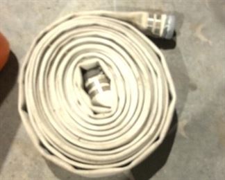 Several 2 inch nylon water hoses with brass fittings several to choose from