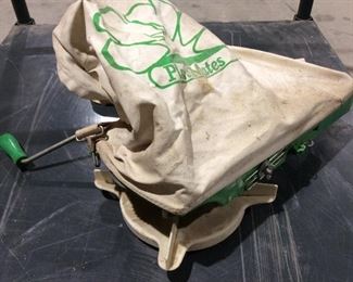 Seed and fertilizer spreader