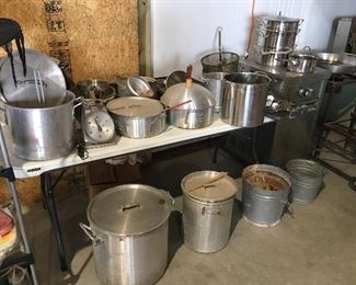 Lots of cooking pots and fryer pots