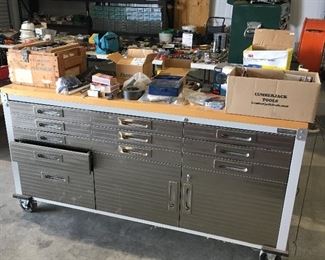 Large Rolling Bench
Stainless front and Butcher block top
Lots of storage and lockable drawers and cabinets