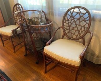 Unusual rattan arm chairs with rattan tea cart