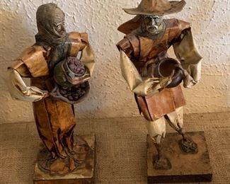 Leather and pottery figurines
