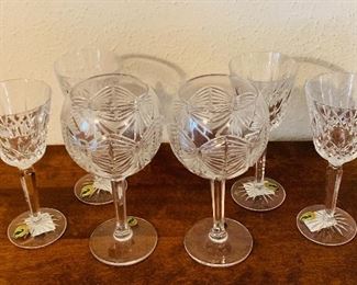 Waterford wine stems in Lismore and clarendon goblets in Waterford butterfly pattern