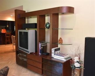 Contemporary Entertainment Unit with Overhead Lights and Glass Shelves