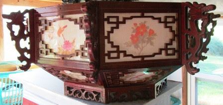 Large Oriental hanging decorative pieces. We have 5 of these.
