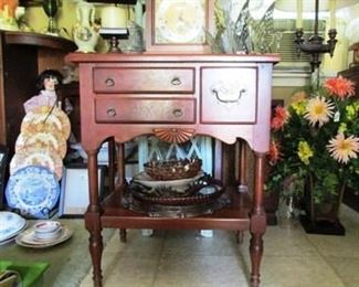 Another view of three-drawer table.