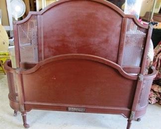 Vintage metal bed with metal mesh in headboard and curved footboard