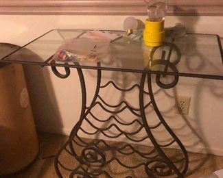 Swirly wine rack table base -- Cher removed the wine to torment me