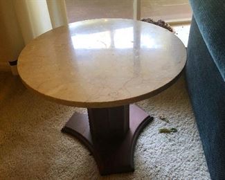 Round table top with thick fish-hook base