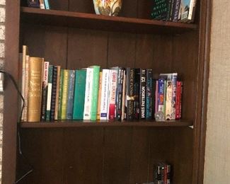 books, cds, sunflower urn that definitely does not contain the ashes of a loved one