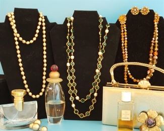 Bvlgari, Chanel perfune, gold evening bag and costume jewelry