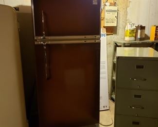Older model brown GE refrigerator