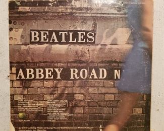 Beatles Abbey Road album and a few more Beatles albums plus Billy Joel, Santana, Jethro Tull pop up album, Eagles, Pure Prairie League and others