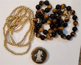 Gold bead necklace, Wedgwood black basalt cameo and tiger eye bead necklace