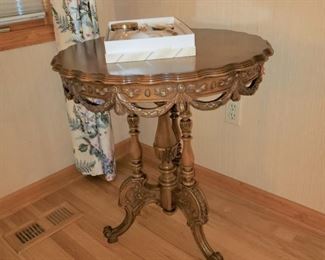 Carved walnut center table