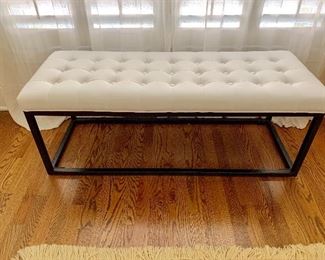 Metal based, leather tufted bench