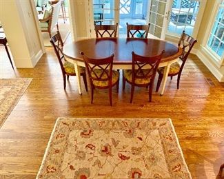 Harden Dining Table with painted legs.  Harden lattice back dining chairs (7 available).  Two armed dining chairs also available.