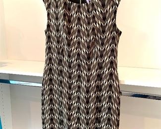 Vince Camuto sleeveless dress; Shoes are 9.5-10
Clothes range from S-L. Most 8/10 and M/L