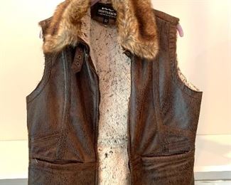 Montanaco leather vest; Shoes are 9.5-10
Clothes range from S-L. Most 8/10 and M/L