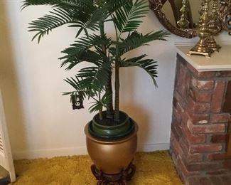 Potted artificial palm tree