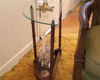 Small glass top end table with decor