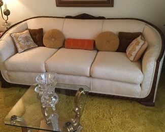 Sofa in Living Room and small glass coffee table - also leaded glass items - lots of pillows