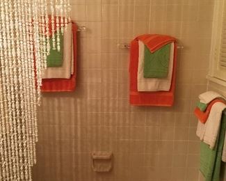 Bathroom 1 - love the beaded curtain!