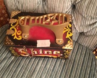 Colorful shoe shine box with contents