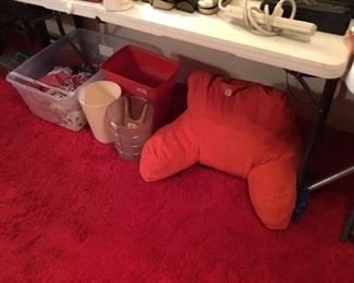 Scarves, wastebaskets, bed pillow