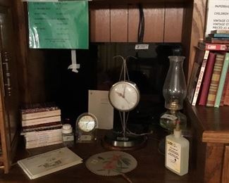 Vintage “United” clock, Westinghouse TV and DVD player, books & more