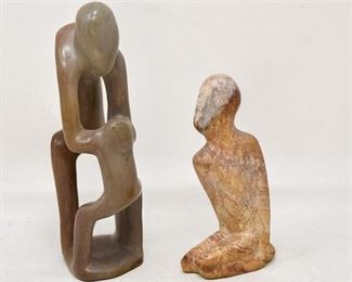 87. Two Carved Stone Figures