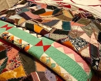 Lots of hand made quilts