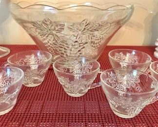 Punch bowl & cups with grape motifs.
