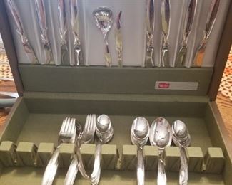 Set of stainless silverware in box