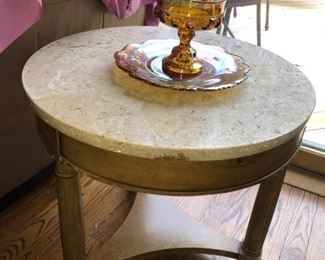 Round travertine topped end table