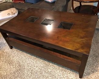 Wood coffee table with square glass inserts