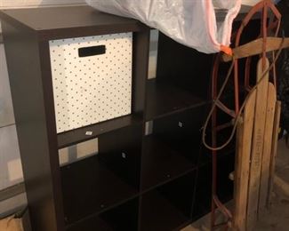 Large storage unit with baskets (all baskets are in the bag on top of unit)