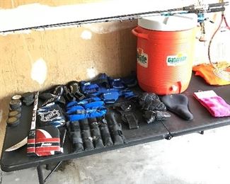  Gatorade water cooler, ankle and wrist weights, Hockey pucks and accessories.