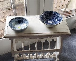 white wooden side table, blue/white bowls