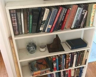 white bookcase -books
