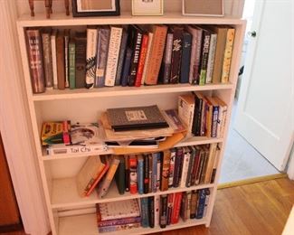 Small white bookshelf-books