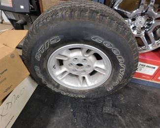 New Goodyear Wrangler 31/10.50R15 LT tire with rim from Ford 150 pickup