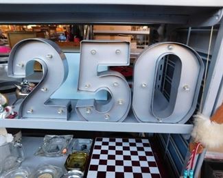 Independent battery operated numbers 2,5 & 0