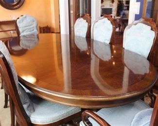 Karges oval shaped dining room table and 8 chairs. Shown here with one leaf and measures 92" long, comes with two additional 20" leaves. This table is immaculate.