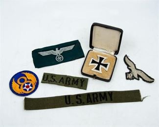 Lot 203. Rare original Nazi items including a 1939 Iron Cross in its original presentation box (very clean!), a green eagle patch, another Luftwaffe eagle patch, a Army Air Corps 8th Air Force Class A patch, a copy of Die Kunst Deutschen Reich magazine from May 1942, and two US Army patches. 