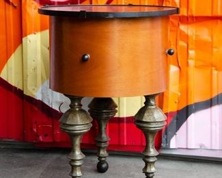 Lot 331. Contemporary mahogany and vaneer drum side table.