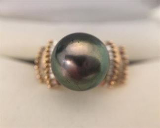Black Tahitian Pearl and Diamond Ring https://ctbids.com/#!/description/share/225564