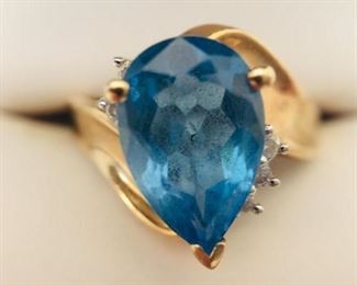 “Swiss” Blue Topaz and Diamond Ring https://ctbids.com/#!/description/share/225581