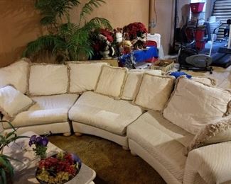 Half moon sectional couch with down filled cusions.