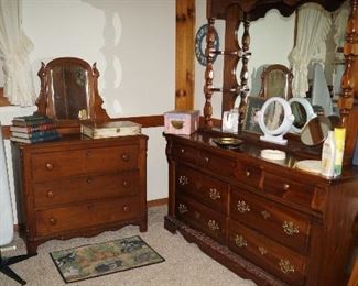 dresser with mirror, ironing board, rug, mirrors, antique bureau